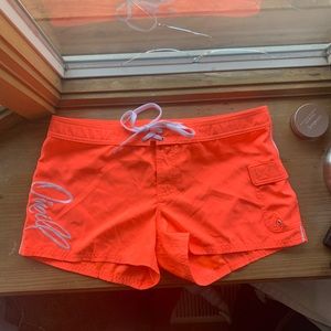 Neon pink O’Neill swim shorts
